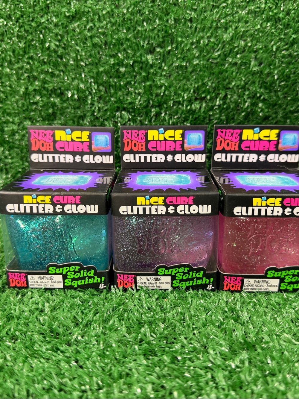 Glitter & Glow Cube Squishy Toy - Blue, Purple, Pink